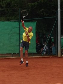 George reaching for a good serve